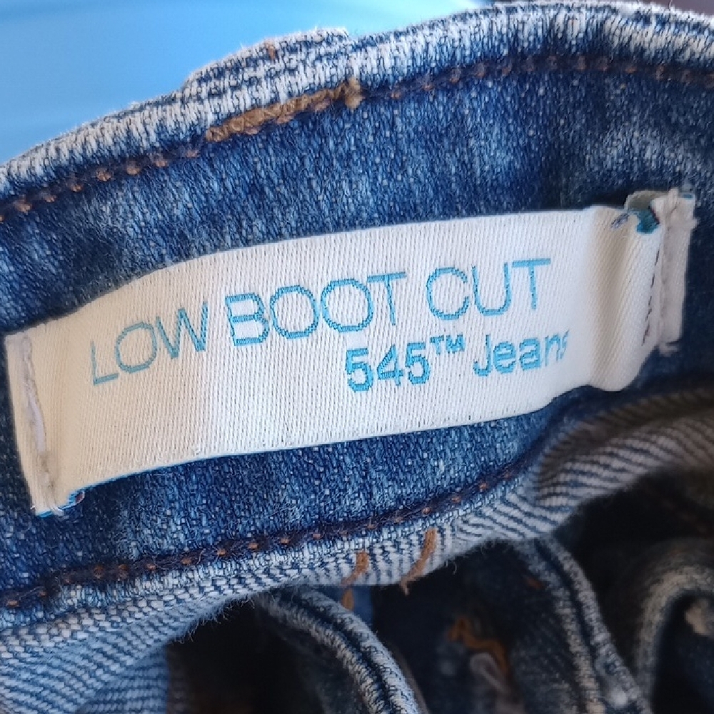 Levi's 545™ Low Boot Cut Jeans in Classic Blue